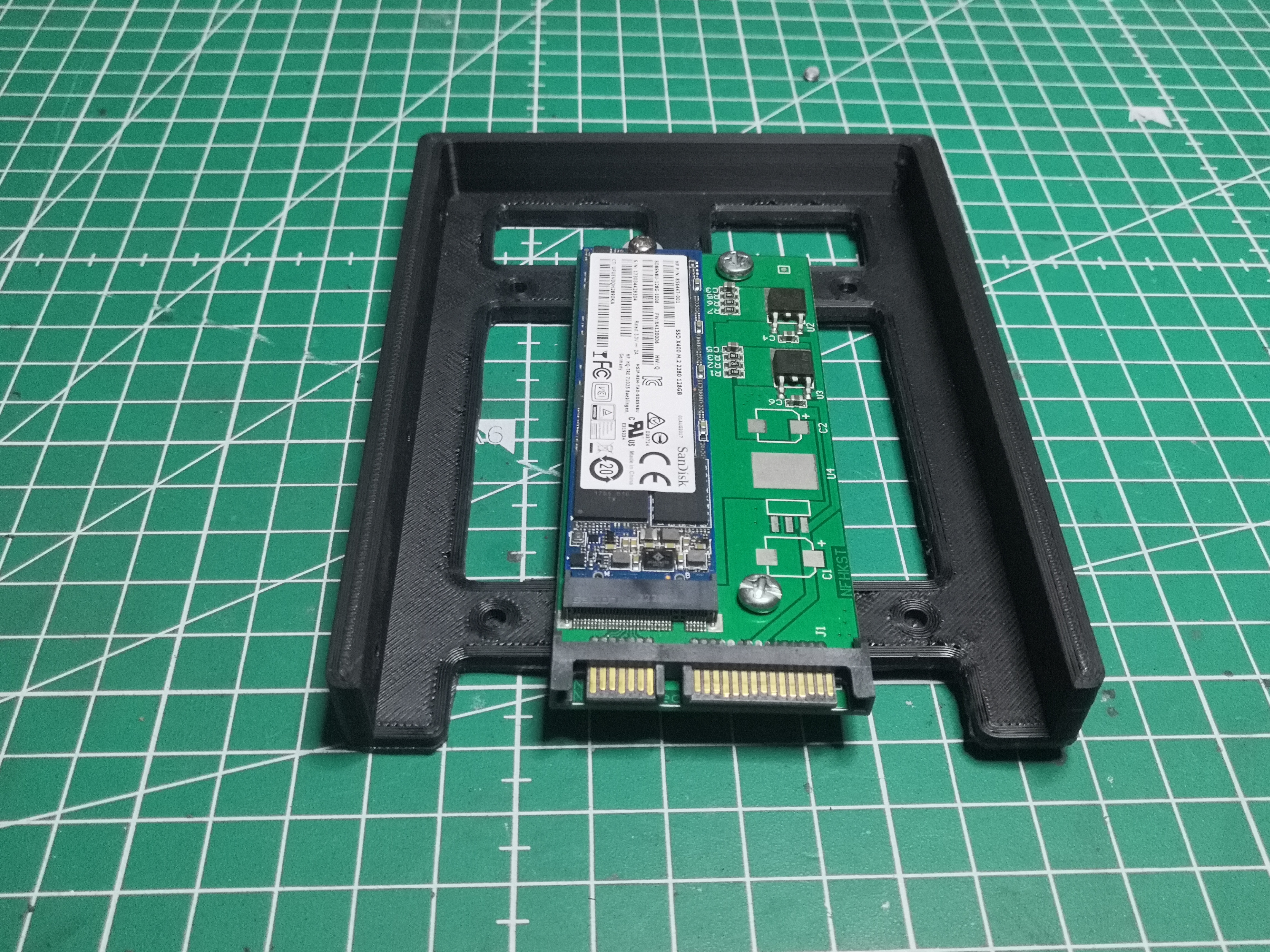 Assemblage SSD + adaptateur dans le caddy