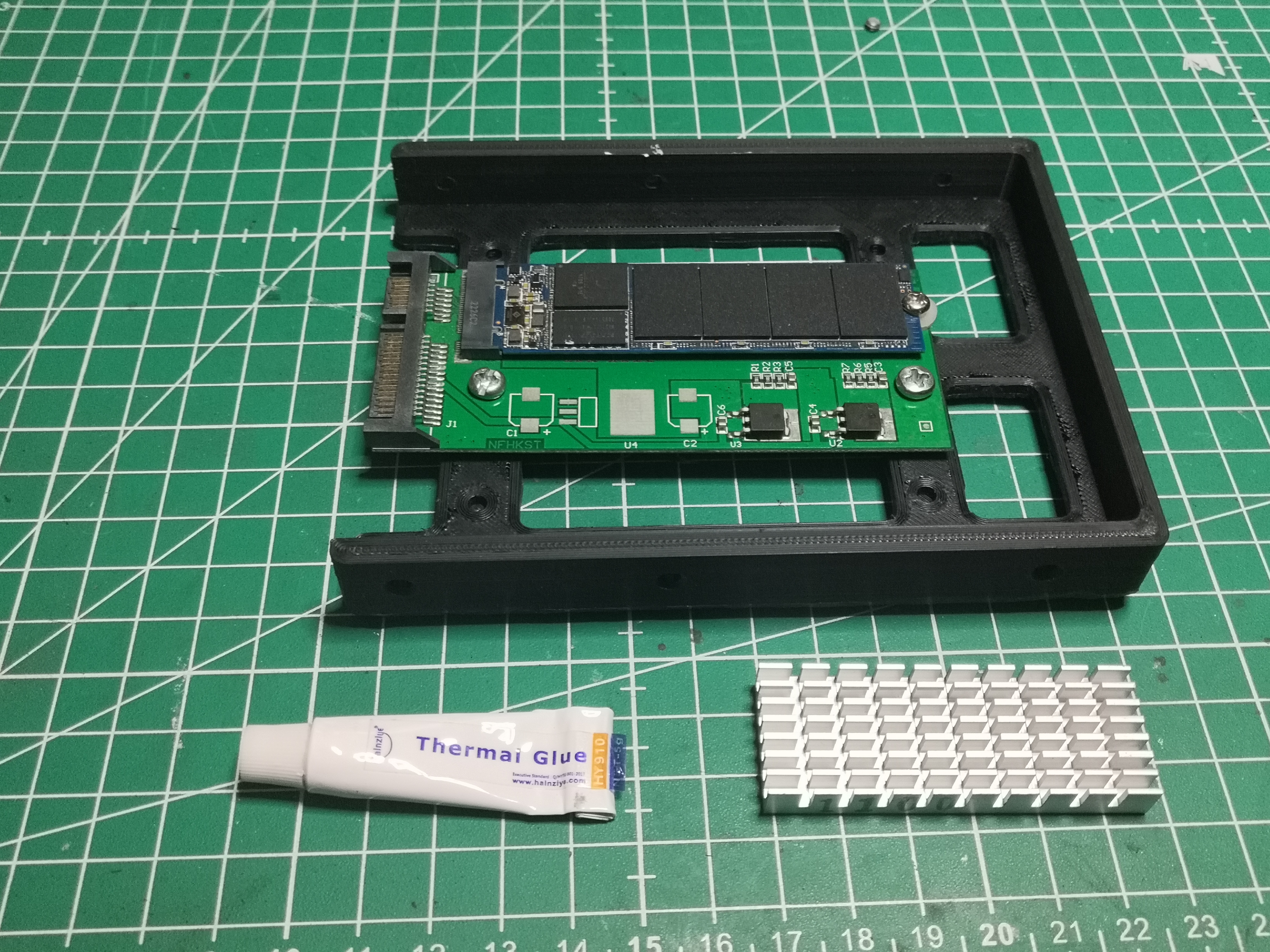 Application de colle thermique sur les puces NAND